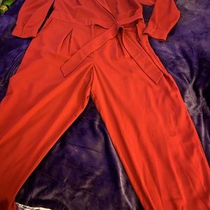 JustFab one piece side tie maroon jumpsuit. Brand new tags on. Never worn